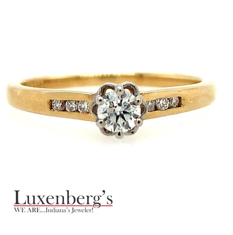 Diamond Illusion Center with Channel set sides Engagement Ring